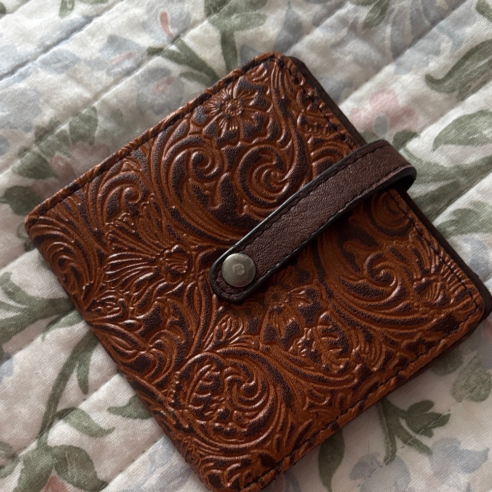 JustinEmbossed Brown Leather Wallet with Snap Closure